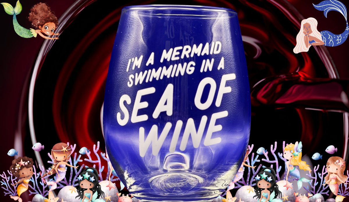Mermaid Sea Of Wine Stemless Wine Glass surrounded by colorful mermaids, coral, fish, and underwater scenery