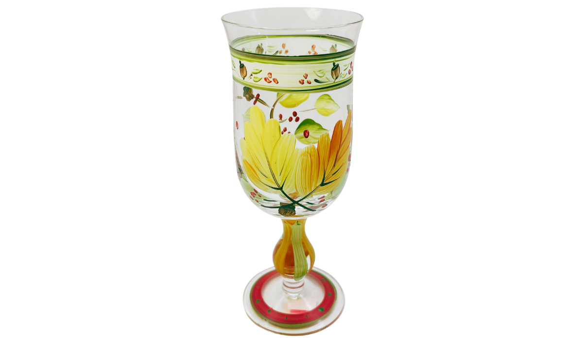 Autumn Leaves Wine Glass front view with hand-painted yellow and orange leaves, green foliage, berries, and decorative border