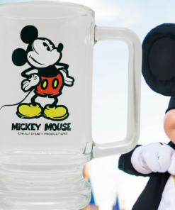Vintage Mickey Mouse glass beer mug displayed with Disney-inspired collectible decor