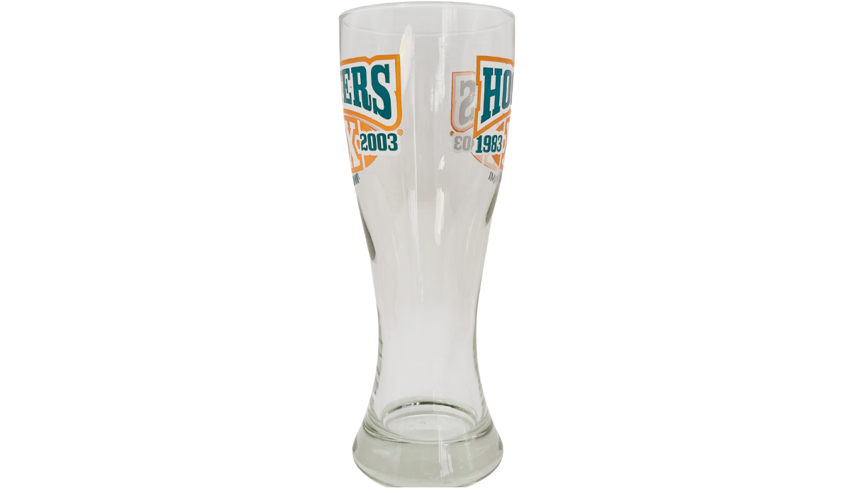 Side view of Vintage Miami Hooters 20th Anniversary pilsner glass with wraparound graphics