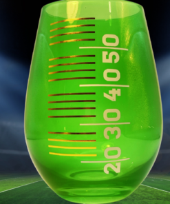 Yard Lines Green Stemless Wine Glass displayed in football stadium game-day scene