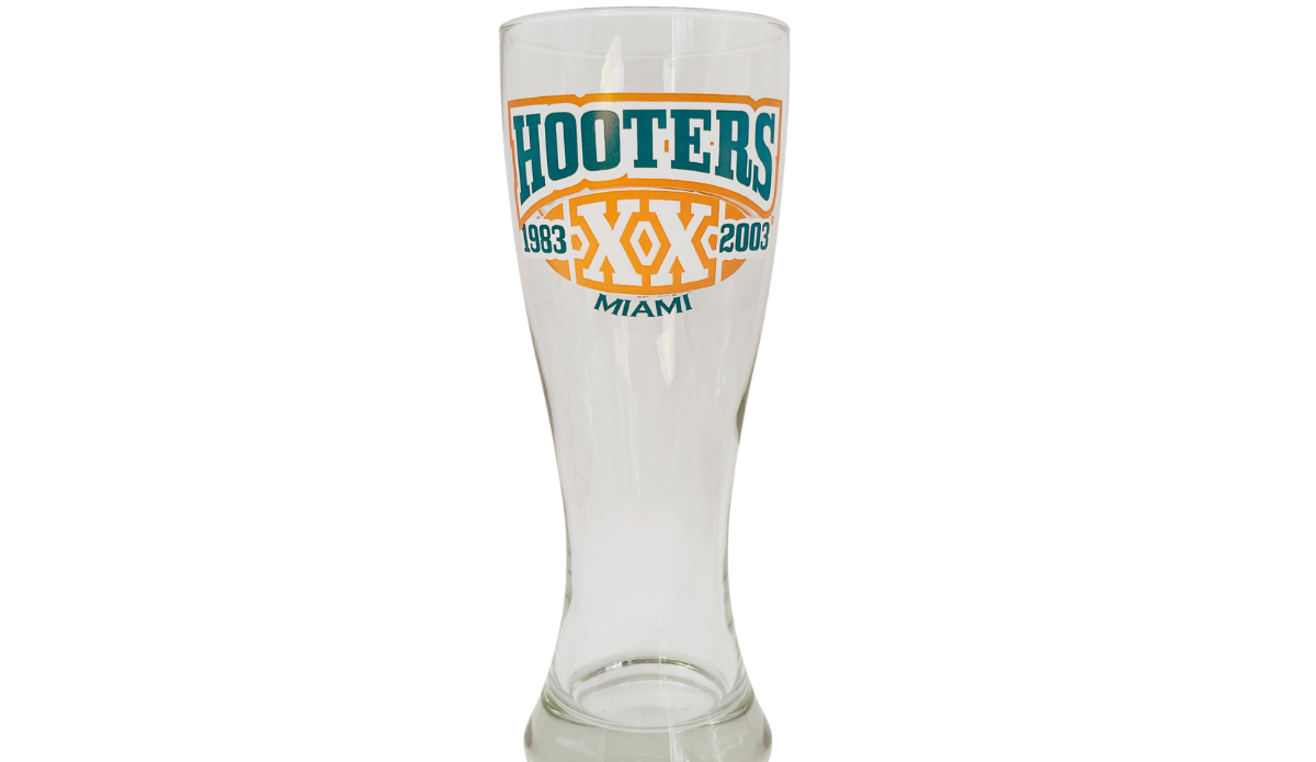 Back view of Vintage Miami Hooters 20th Anniversary pilsner glass with Hooters XX Miami artwork