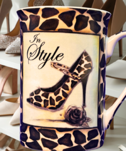 Kent Pottery leopard print shoe mug styled in boutique shoe closet setting