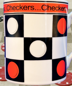 Godinger Checkers Coffee Mug displayed in front of a checkerboard with red and black playing pieces arranged across the game surface.