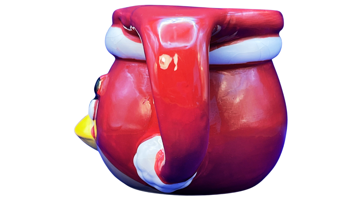 Rear handle view of 3D Angry Bird Santa Mug with large curved red handle and white lower accent