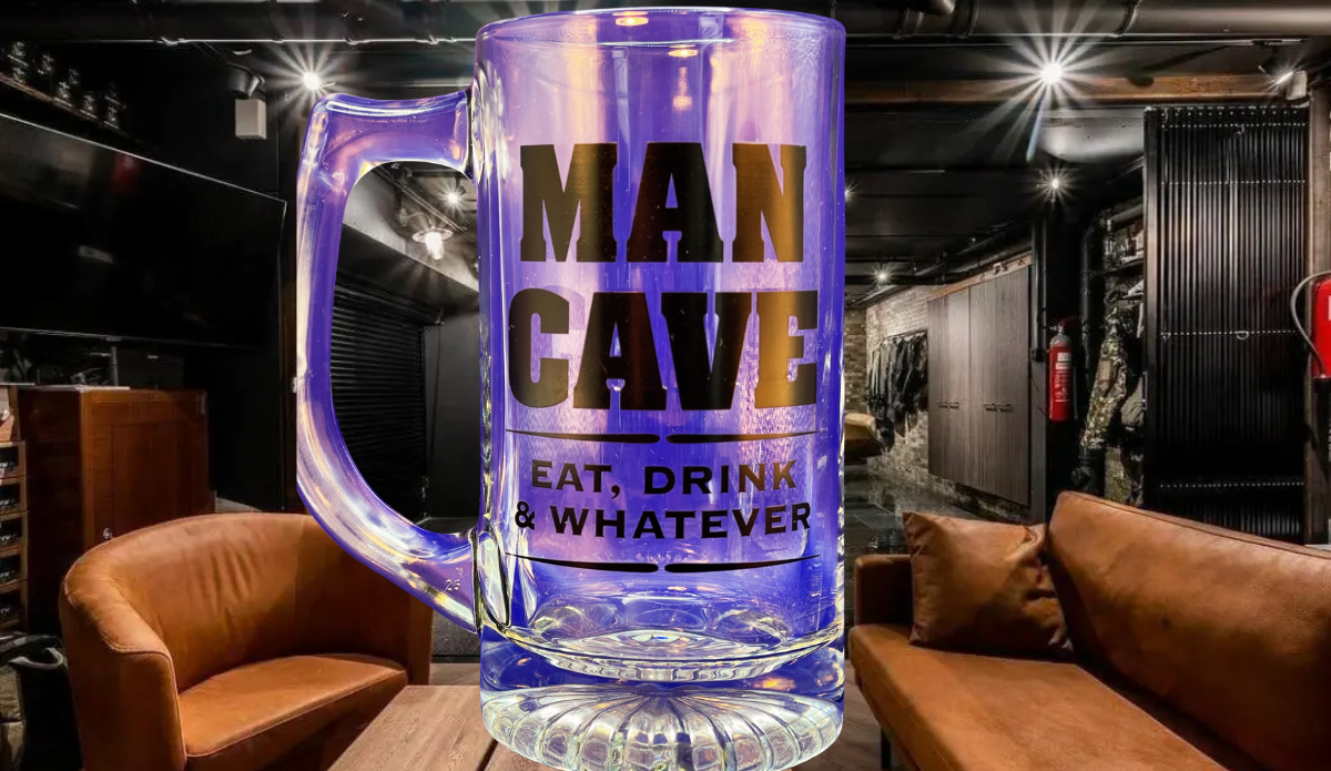 Man Cave Beer Mug displayed in a dark home lounge with brown leather seating