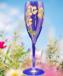 Perrier Jouet Pink Floral Champagne Flute styled with flowers outdoor setting