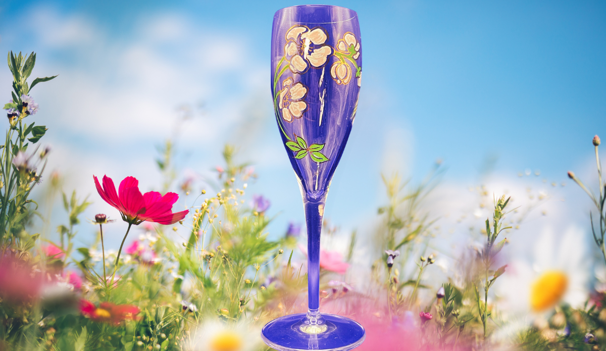 Perrier Jouet Pink Floral Champagne Flute styled with flowers outdoor setting
