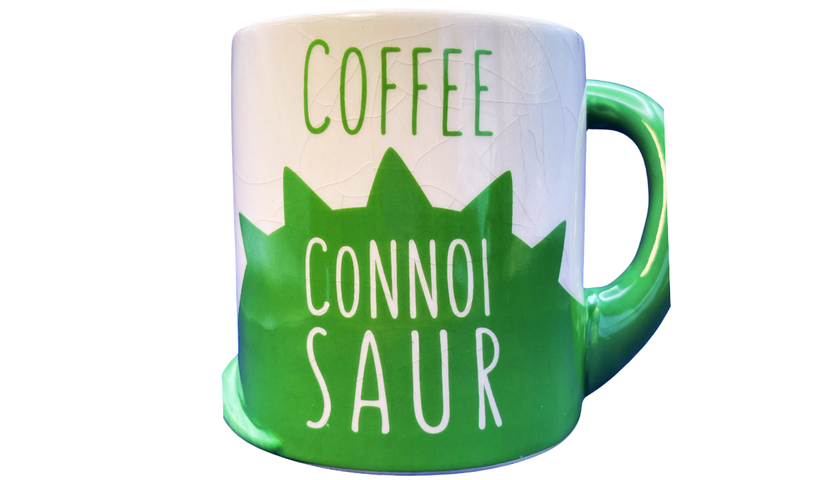 Back of BigMouth Coffee Connoisaur Dinosaur Mug featuring the repeated Coffee Connoisaur design and dinosaur tail