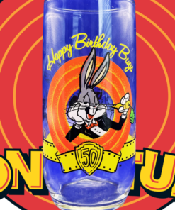 Bugs Bunny 50th Anniversary Glass displayed against classic red and orange Looney Tunes rings.