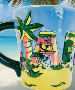Jamaica 3D souvenir mug styled on a tropical beach with palm trees and turquoise water