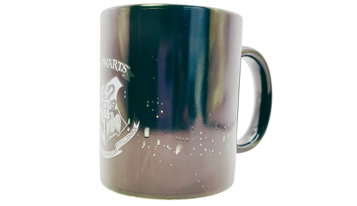Harry Potter Hogwarts Heat Activated Mug cool state with Hogwarts crest on black ceramic mug