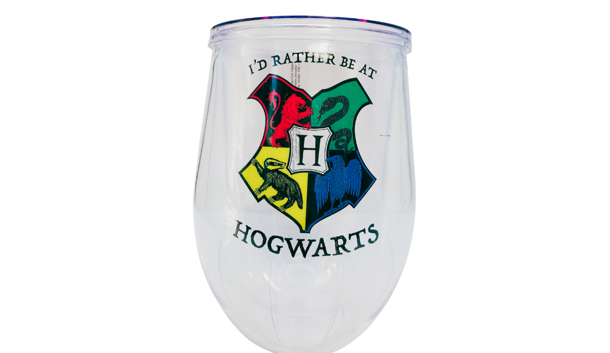 Harry Potter Hogwarts Stemless Travel Tumbler front view featuring the colorful Hogwarts crest with the phrase "I'd Rather Be At Hogwarts" on a clear double-wall acrylic tumbler.