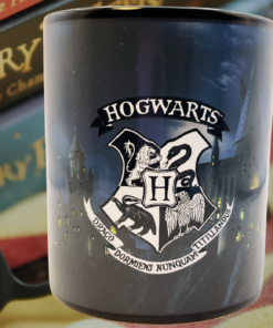 Harry Potter Hogwarts Heat Activated Mug displayed with Harry Potter books after heat activation