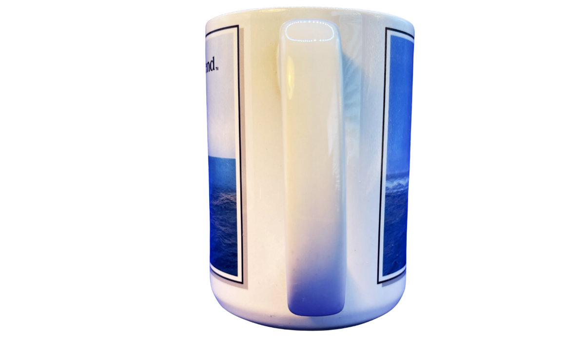 Carnival Legend Cruise Ship Souvenir Mug handle view showing wraparound ocean artwork continuing behind the handle