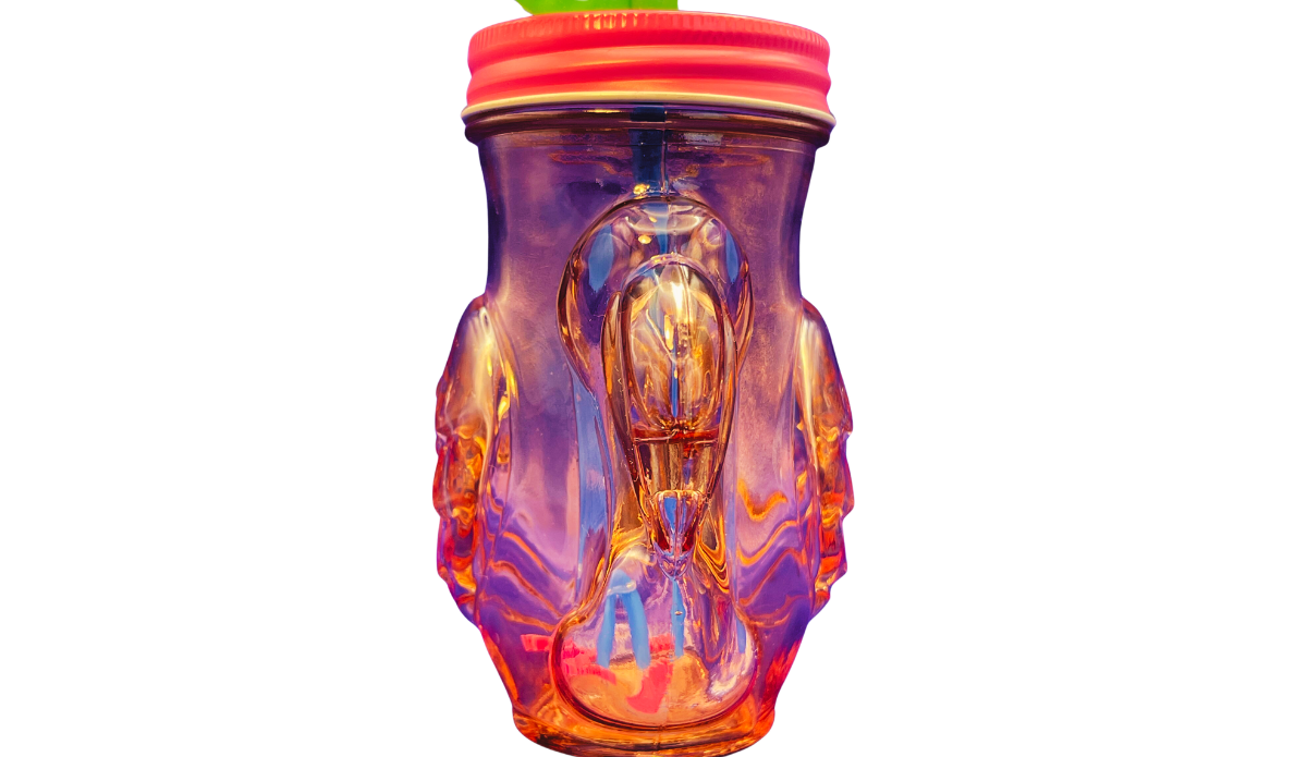 pink flamingo mason jar tumbler front view showing blue straw centered inside transparent pink glass with glowing light reflection