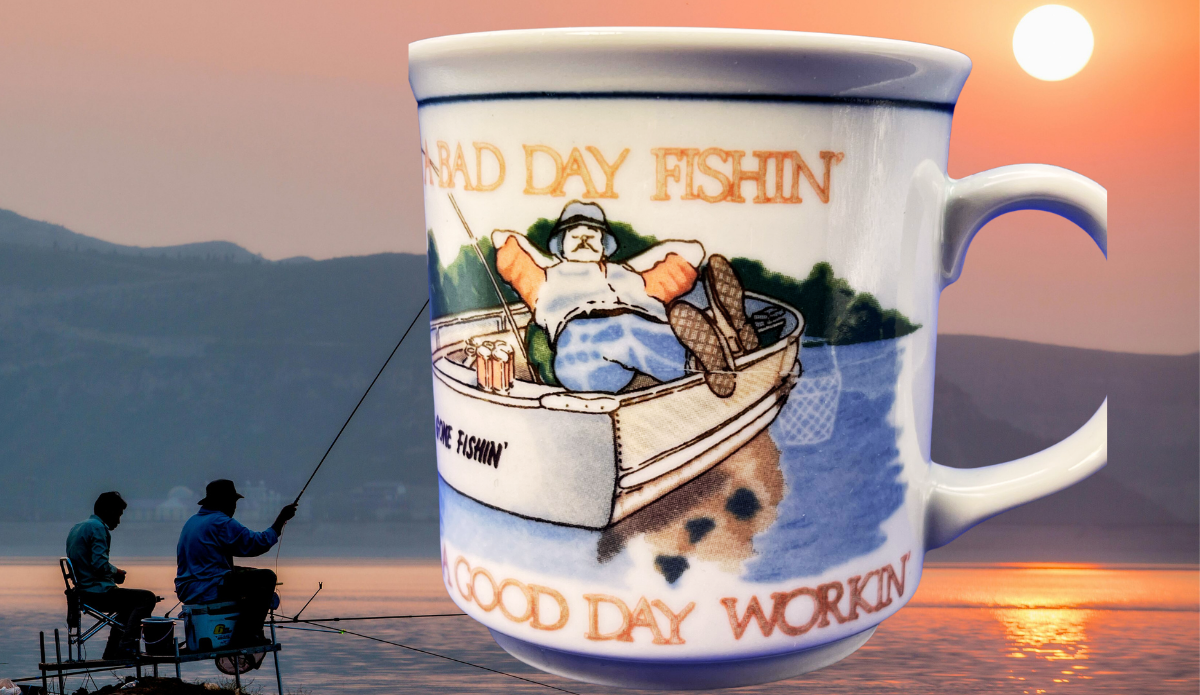 Bad Day Fishing Good Day Working Mug displayed beside fishermen enjoying a sunset fishing trip on the water