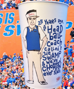 Florida Gators Steve Spurrier The Swamp souvenir cup displayed inside a packed Gators football stadium