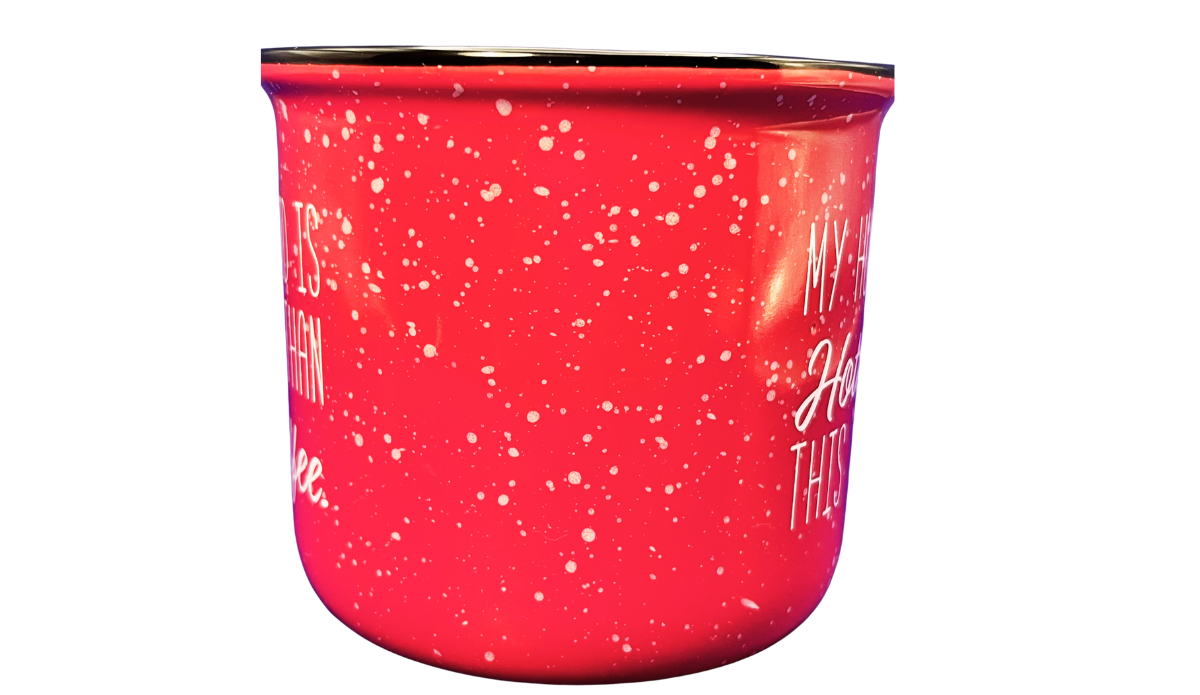 Side view of husband hotter coffee mug showing full cream message, red speckled glaze, dark rim, and handle
