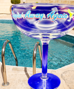 sippin away again margarita glass poolside lifestyle image with tropical vacation vibe