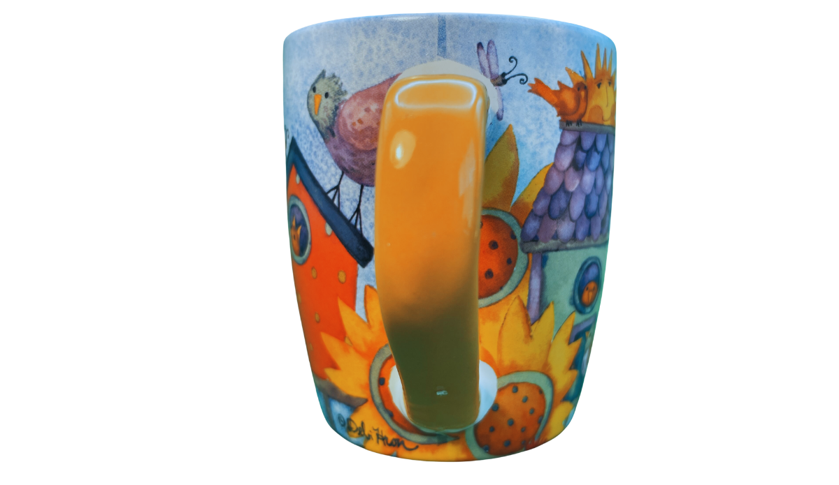 sunflower birdhouse mug handle side view with bird and floral design