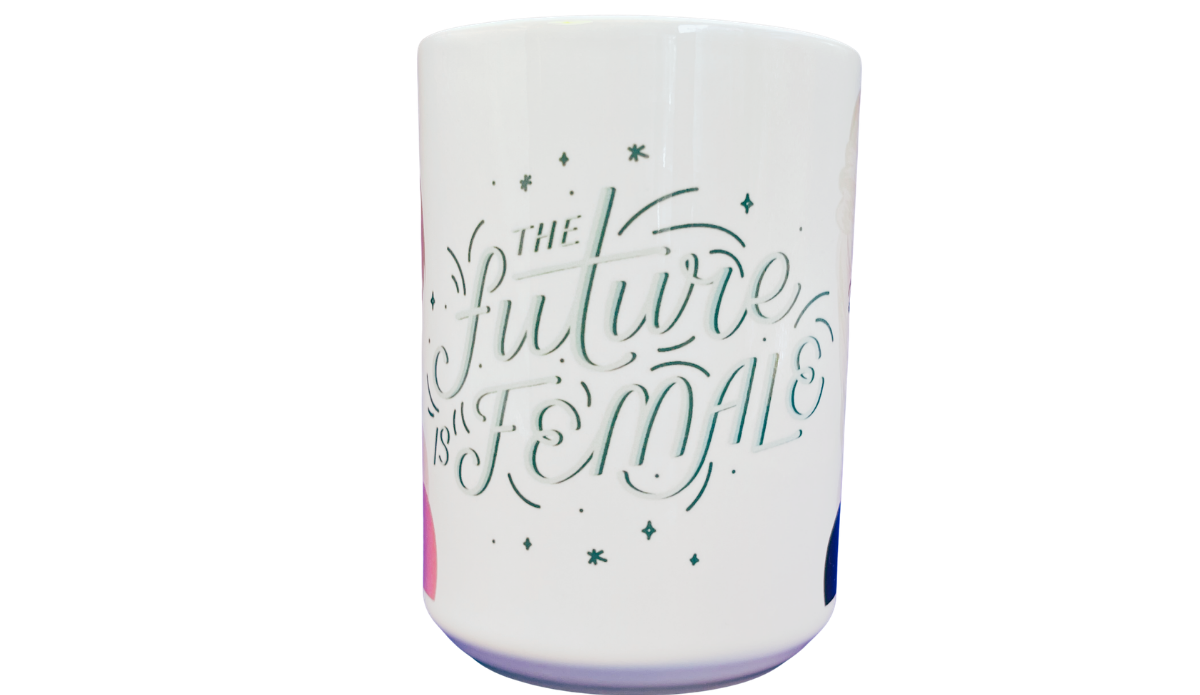 Dolly Parton Taylor Swift Future Is Female Mug middle view with The Future Is Female script and decorative star accents