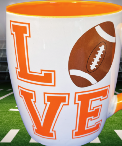 Jumbo Football Love Game Day Coffee Mug displayed in football stadium game day scene