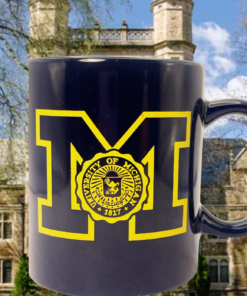 University of Michigan Logo Mug displayed in a University of Michigan campus setting