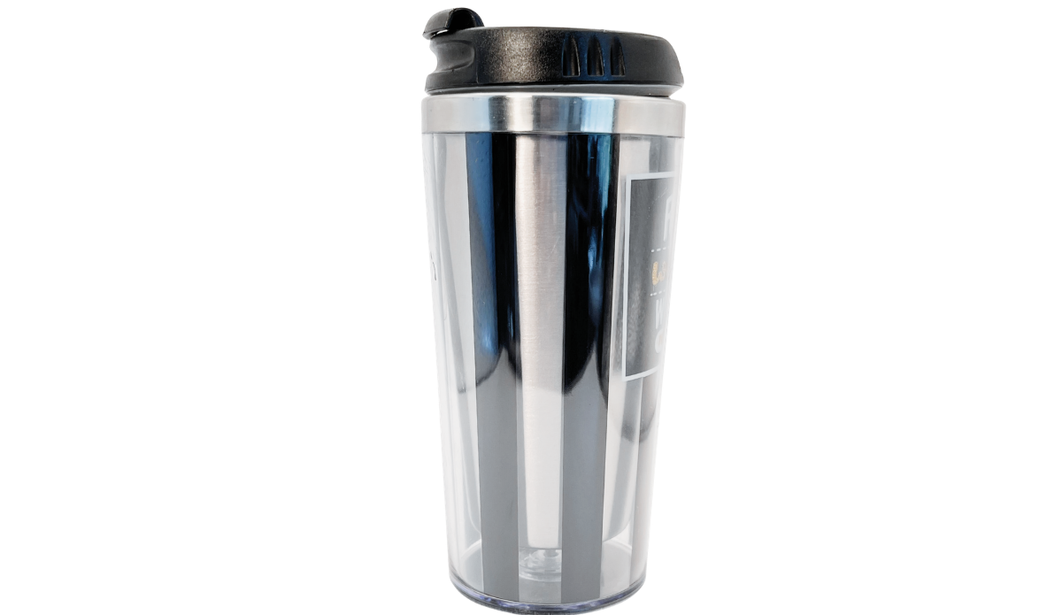 Middle view of Real Women Watch Football Tumbler with clear outer body, silver and black vertical sections, and black lid