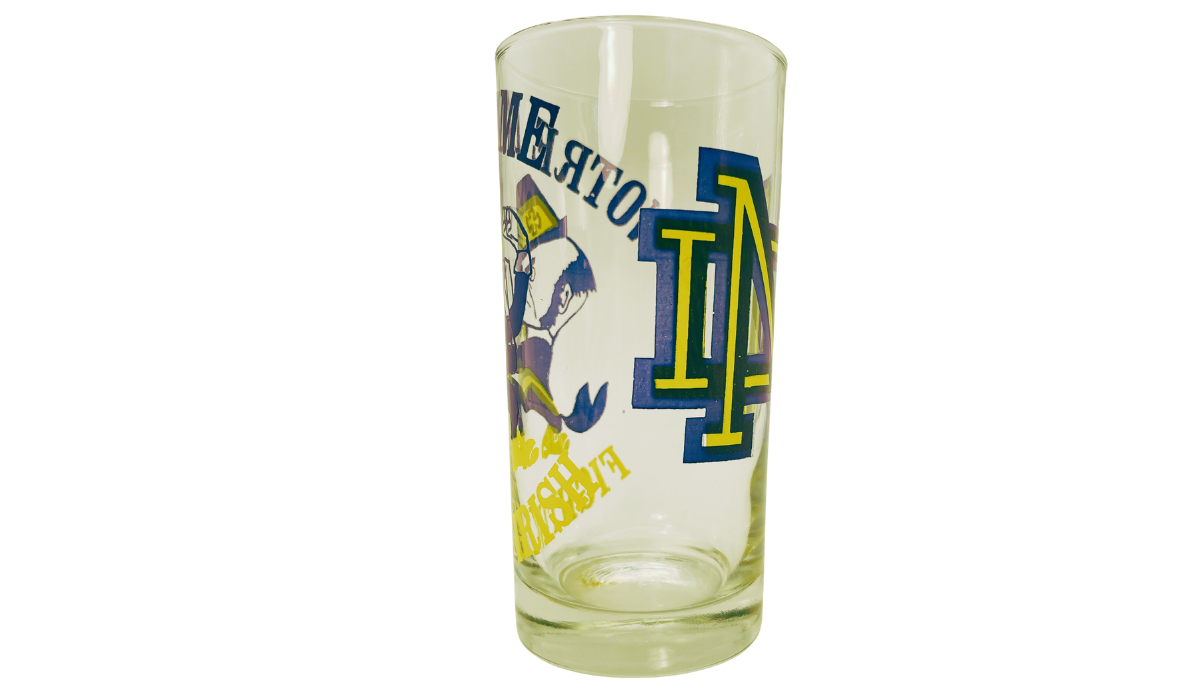 Fighting Irish Leprechaun Glass transition view showing the ND monogram, Notre Dame lettering, and part of the mascot artwork