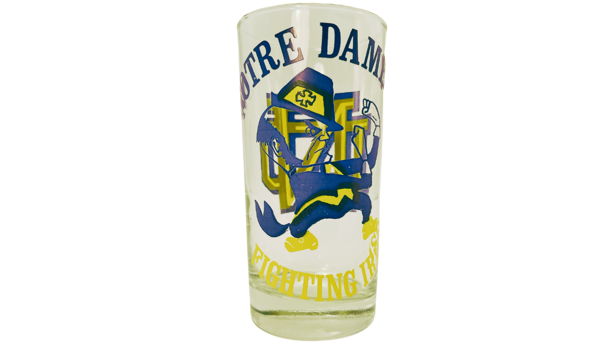 Fighting Irish Leprechaun Glass side view with Notre Dame mascot, blue and yellow artwork, and Fighting Irish lettering