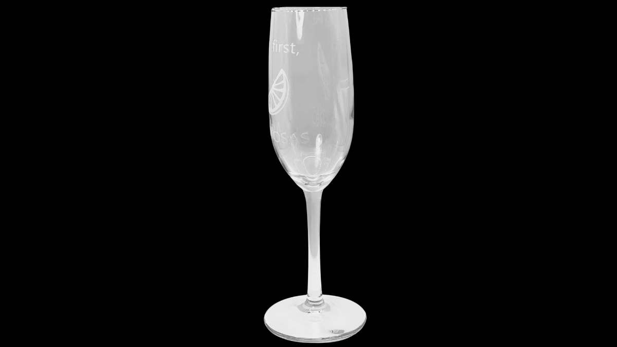 First Mimosas Champagne Flute side middle view full flute angle on black background