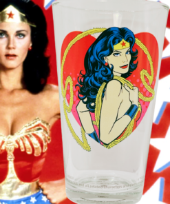 Wonder Woman Hotness Pint Glass displayed with classic Wonder Woman superhero imagery and red white and blue star background