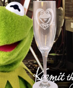 Kermit Frog Champagne Flute displayed with Kermit the Frog background