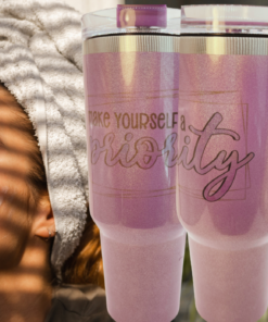 Make Yourself A Priority Tumblers beside woman enjoying a self-care skincare moment in a relaxing home setting