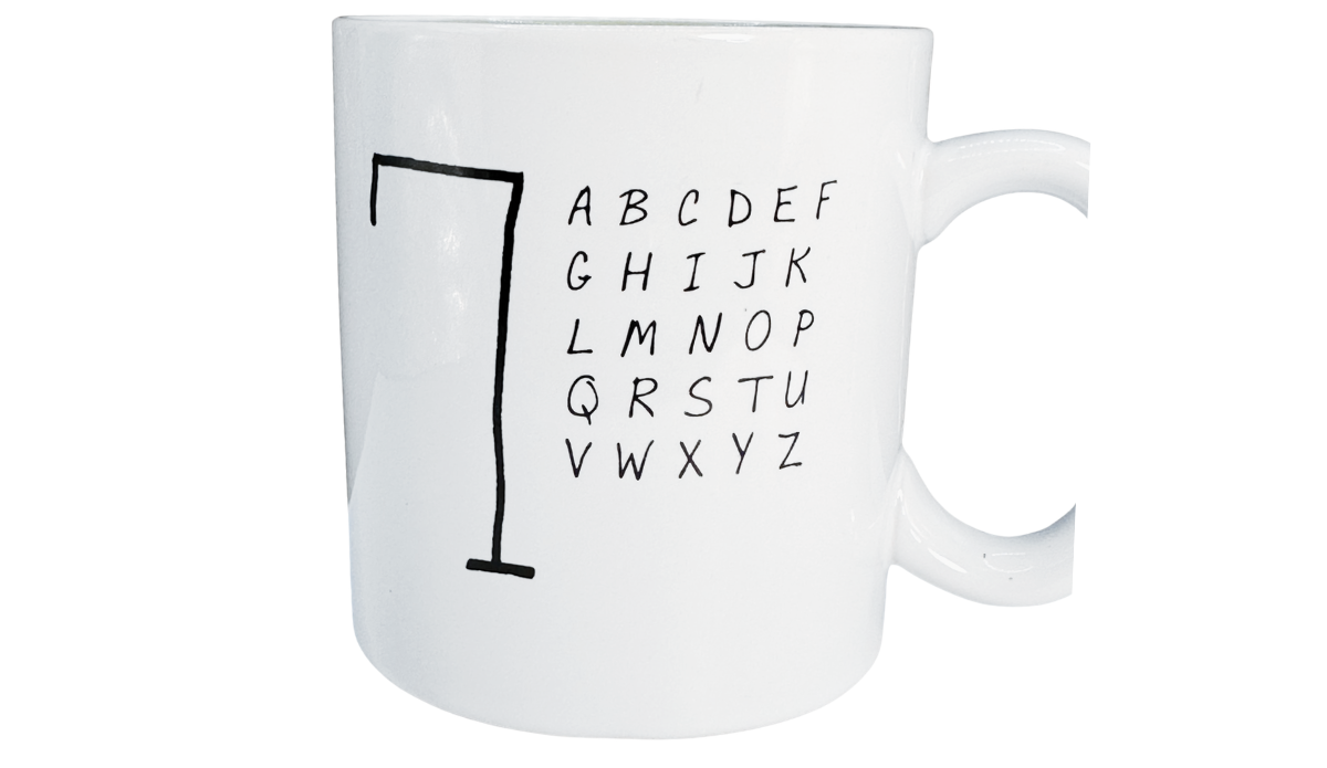 Hangman Game Coffee Mug additional front view showing the black alphabet letters and gallows illustration on a glossy white ceramic body.