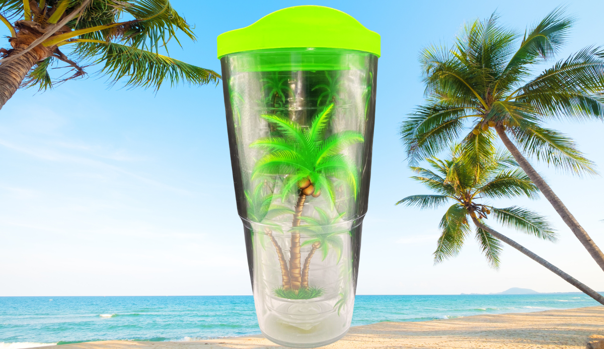 Palm Trees Tervis Tumbler styled beside tropical beach décor and island-inspired drink accessories