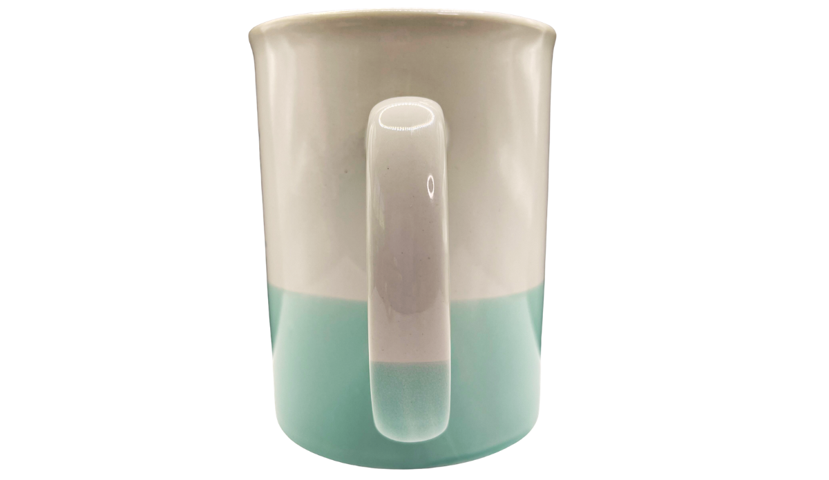 Front view of oversized ceramic mug featuring gray script lettering with cream and mint color split