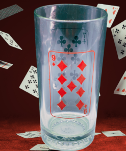 Diamonds and Clubs Drinking Glass displayed against deep red background with floating playing cards for a retro poker-night scene