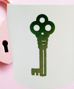 Key Lock Couples Mug styled beside pink Valentine heart lock background