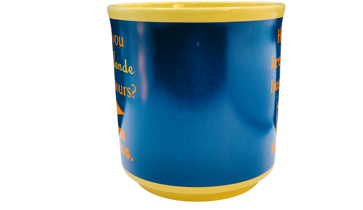 How Do You Keep A Blonde Busy Mug middle view with wide deep blue center and partial joke lettering along both sides