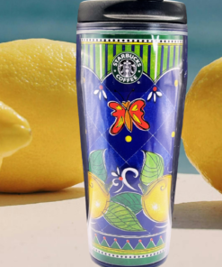 2003 Lemons Butterflies Tumbler displayed with fresh yellow lemons in a sunny citrus setting