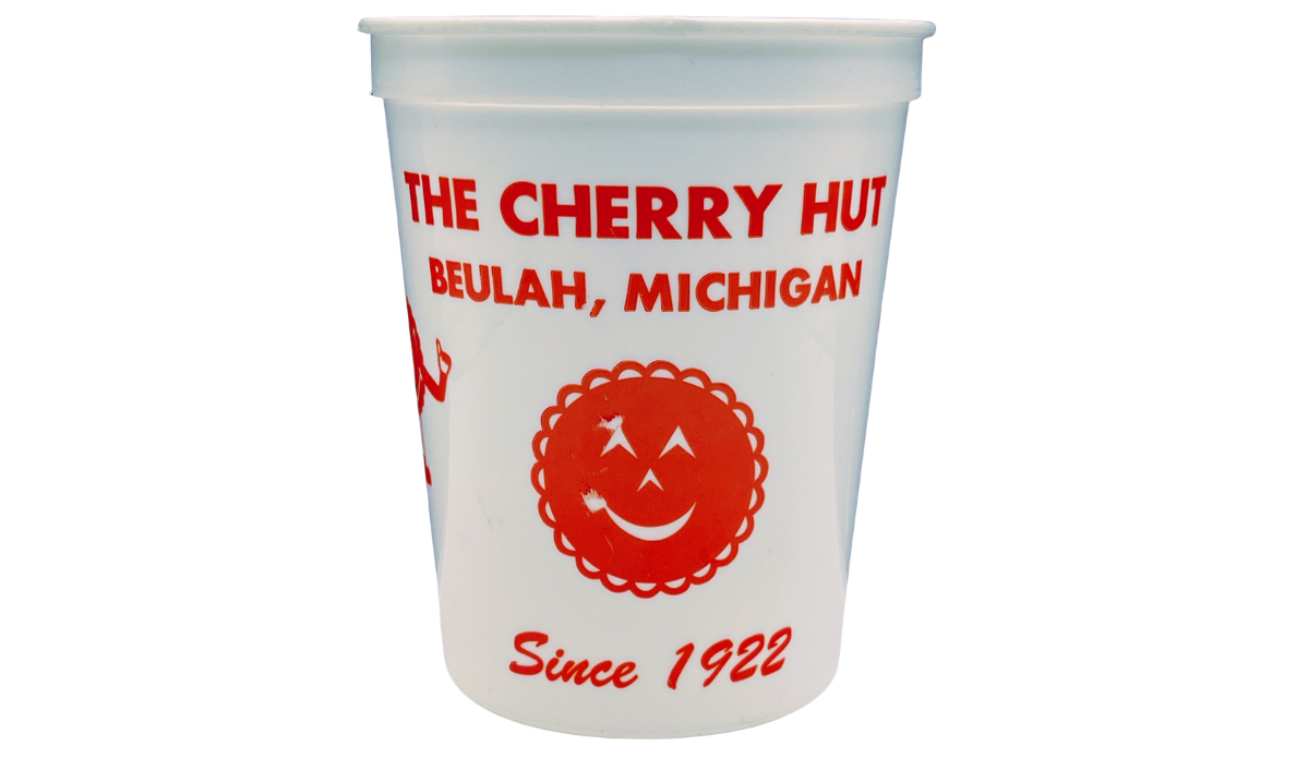 Vintage Cherry Hut Beulah Michigan souvenir cup with red smiling cherry logo and Since 1922 lettering