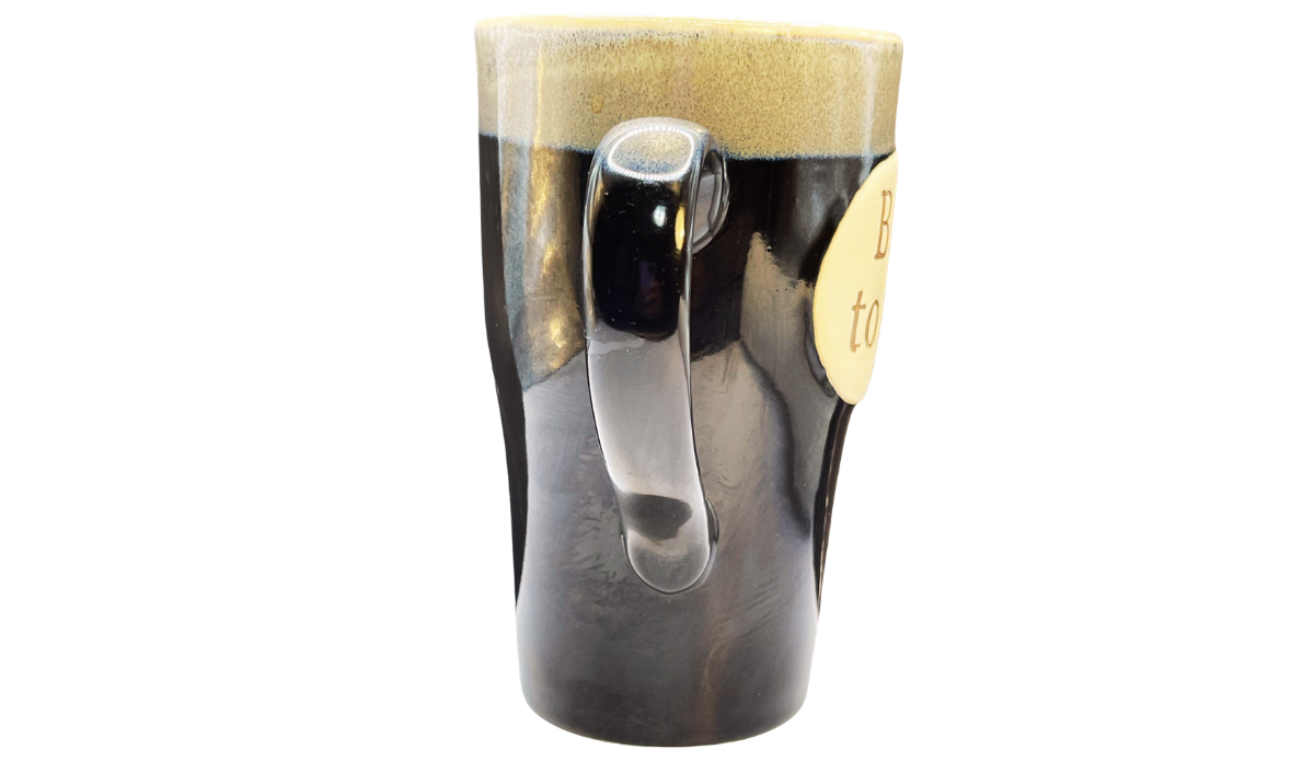 Born To Fish Latte Mug handle view showing artisan pottery styling