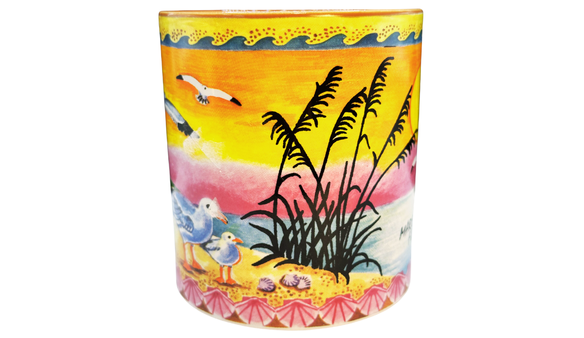 Middle view of Marco Island Florida souvenir mug featuring seagulls, sea oats, seashells, and wraparound Gulf Coast beach artwork.