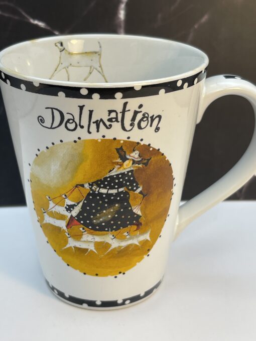 Bring a playful touch of elegance to your routine with the Jennifer Garant Roscher Dollnation Mug. It's the perfect #cupofmood making morning a fun affair!