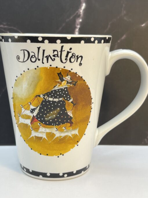 Bring a playful touch of elegance to your routine with the Jennifer Garant Roscher Dollnation Mug. It's the perfect #cupofmood making morning a fun affair!