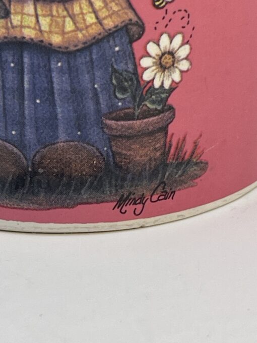 Bring a touch of heavenly beauty to your mornings with the Pink Mindy Cain Garden Angel Mug. It's the perfect #cupofmood and a little serenity in every sip.