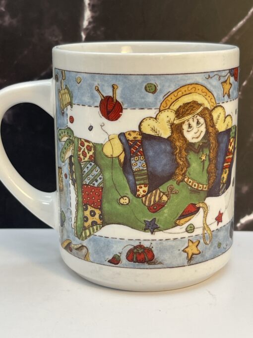 Meet your new favorite sip companion: the Sewing Angel Prayer Mug. It's the perfect #cupofmood for sewing queens, quilting mavens, and craft room angels. 