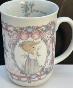 The Precious Moments Mother Is Love Mug is the perfect #cupofmood to celebrate Mom with timeless charm and daily inspiration.